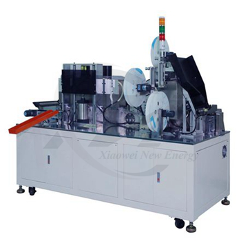 Cylindrical cell labeling and shrink machine